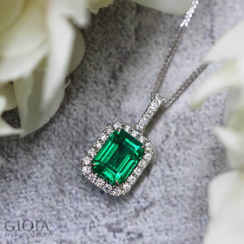 No Oil Emerald Gemstone Pendant Customised with Halo Round Diamonds - Customised Fine Jewellery at GIOIA Fine Jewellery, with quality vivid no oil (non treated) emerald gemstone | Local Singapore Private Jewellery in bespoke customised Jewellery