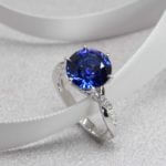 Unique rare round shape cut blue sapphire customised with round diamond engagement ring | Local Singapore Jeweller in wedding jewellery and wedding rings