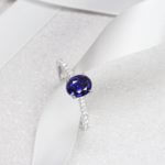 Colour Change Sapphire Engagement Ring, Changes colour from violet to blue unheat sapphire gemstone. Customised with round brilliance diamond | Local Singapore Jeweller in customised and bespoke jewellery with sapphire gemstone