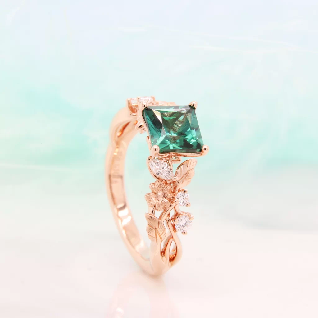 Custom Unique Flora Ring Perspective with Green Tourmaline and side diamond Unique Proposal Ring