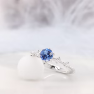 Sapphire Engagement Ring Blue Round Brilliance side spaced out diamond platinum unique proposal ring Best Sapphire Jewellery Shop