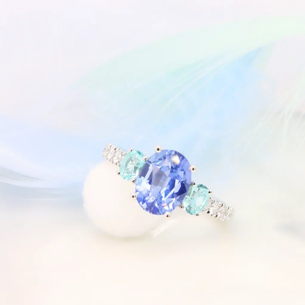 Blue Sapphire Engagement Ring unheated with side Paraiba Tourmaline Perspective